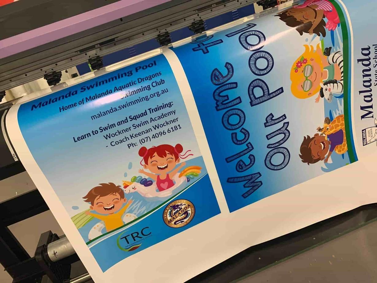 A Poster That Says Welcome To Our Pool Is Being Printed On A Printer — Cairns Signcorp In Port Douglas, QLD