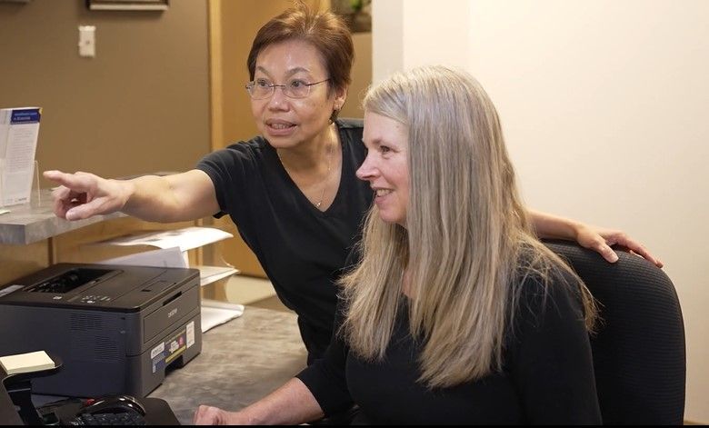 Team helping a patient with options