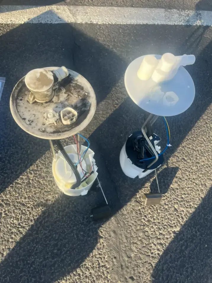 Three small round tables with cups and coffee supplies on asphalt in bright sunlight.