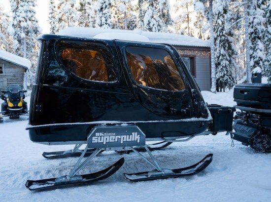Covered heated sled