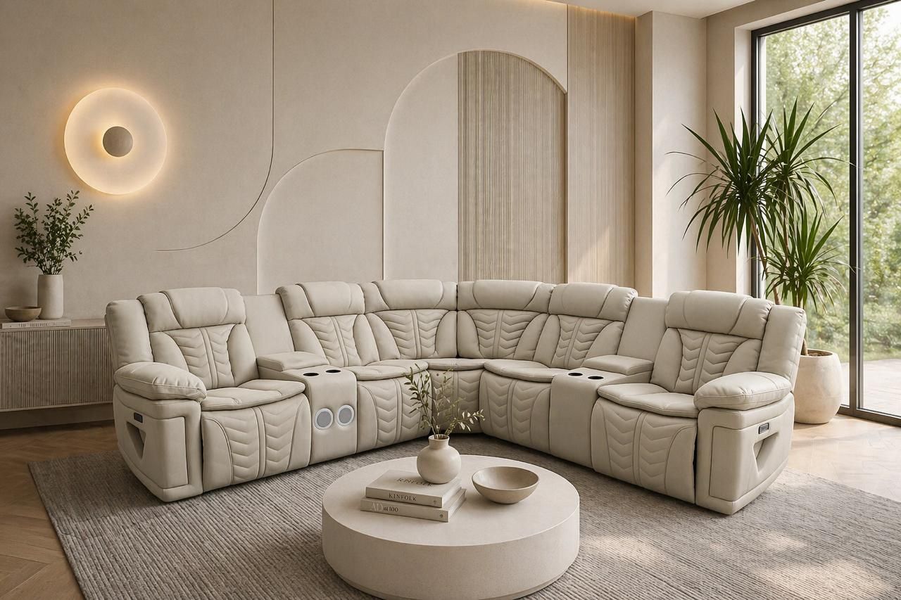 A living room with a sectional couch and a coffee table