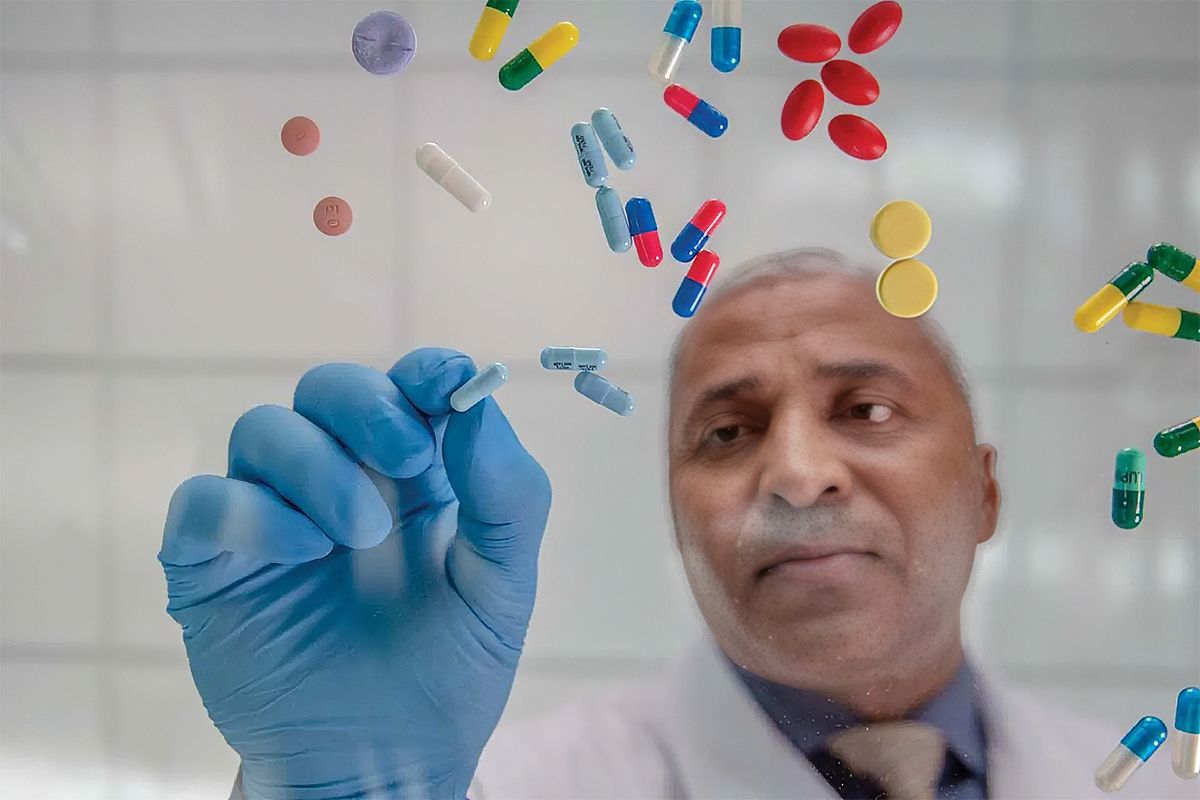 Pharmacist sorting medication