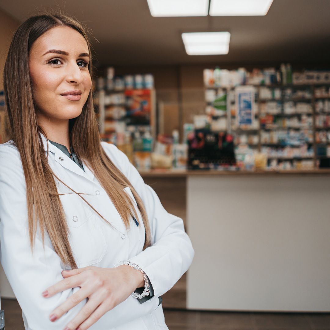 Compassionate pharmacist contemplating their upcoming promotion.