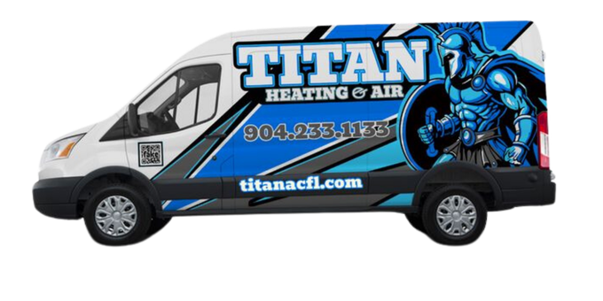 Branded Titan Heating & Air service van showcasing HVAC company contact and website