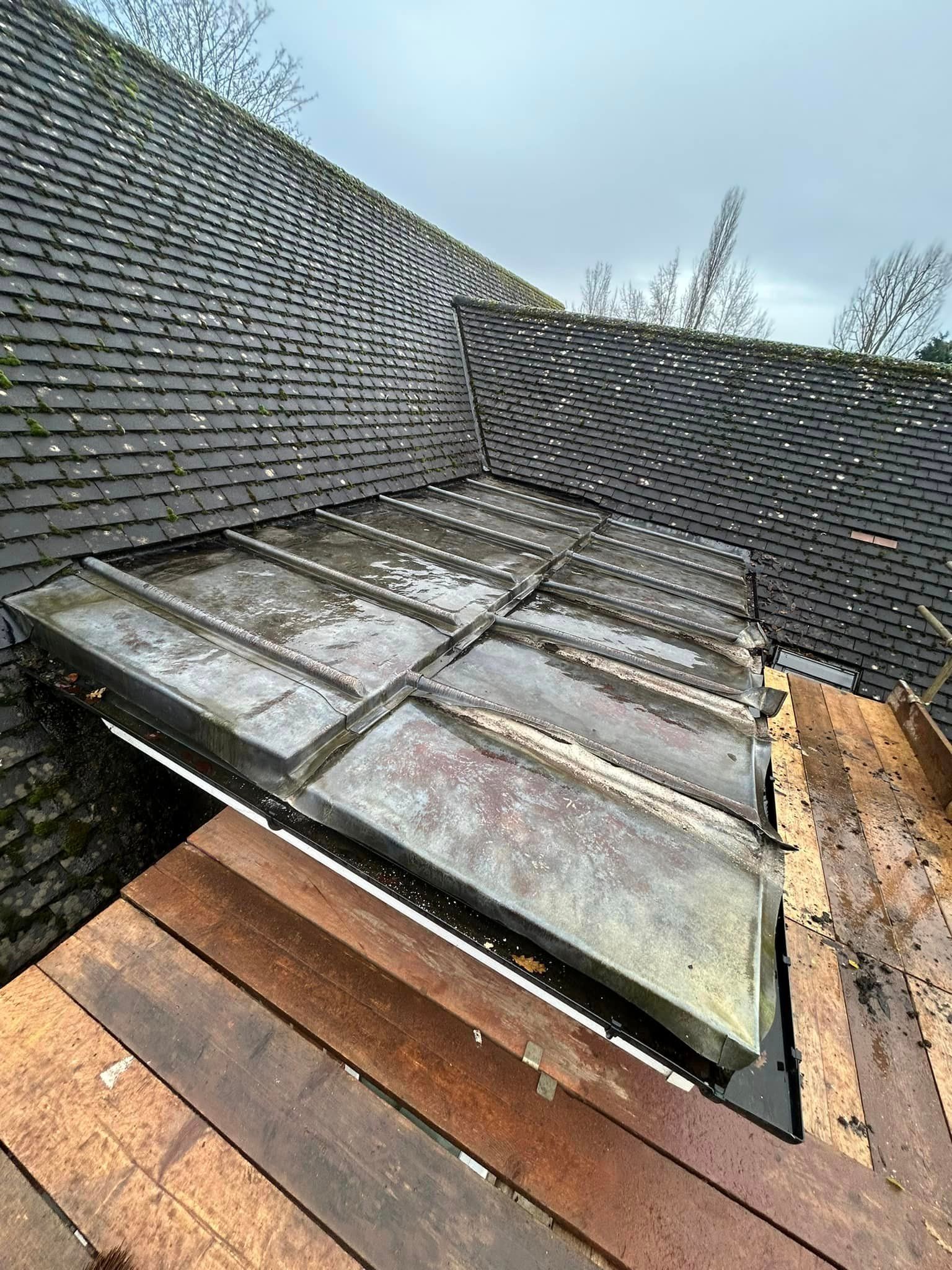 A flat roof being replaced with exposed timber