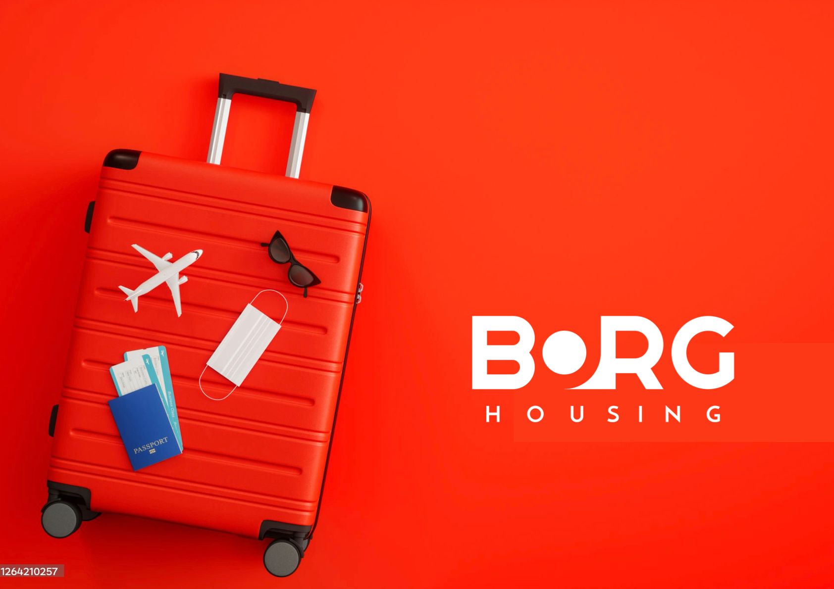 Punainen matkalaukku ja Borg Housingin logo / Red suitcase and Borg Housing logo