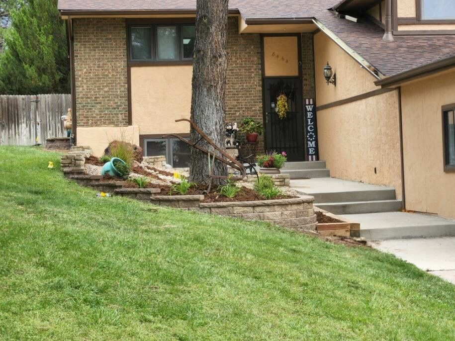 A house with stairs leading up to the front door