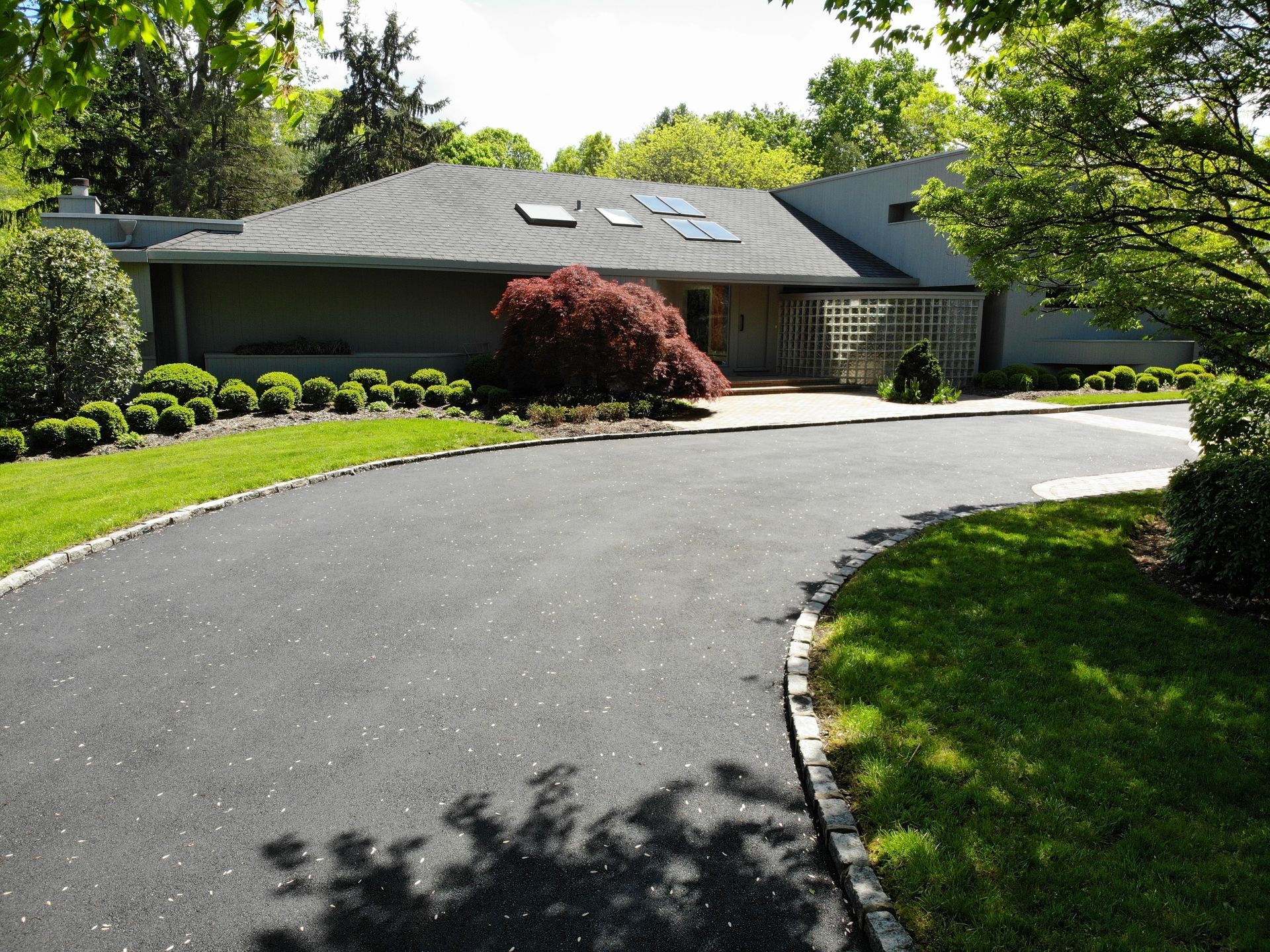 Wide Driveway in Front of the Gray House — Westbury, NY — A&M D’Alessandro Contractors Inc.