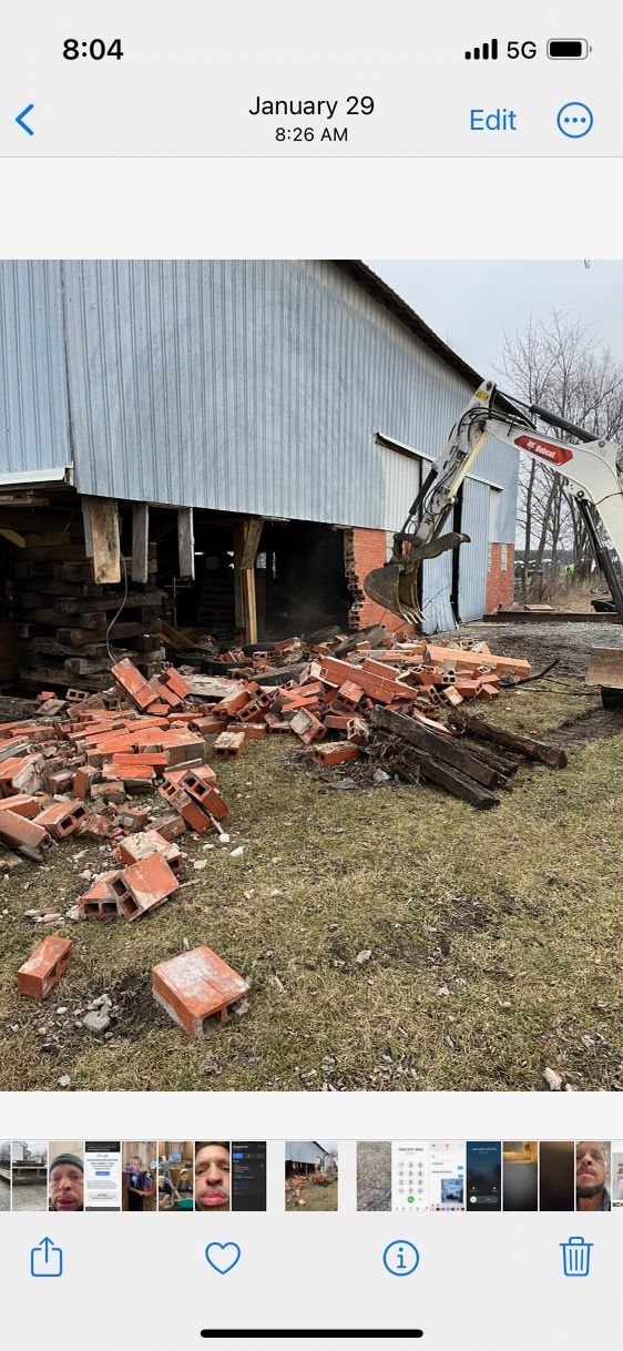 A picture of a barn being demolished