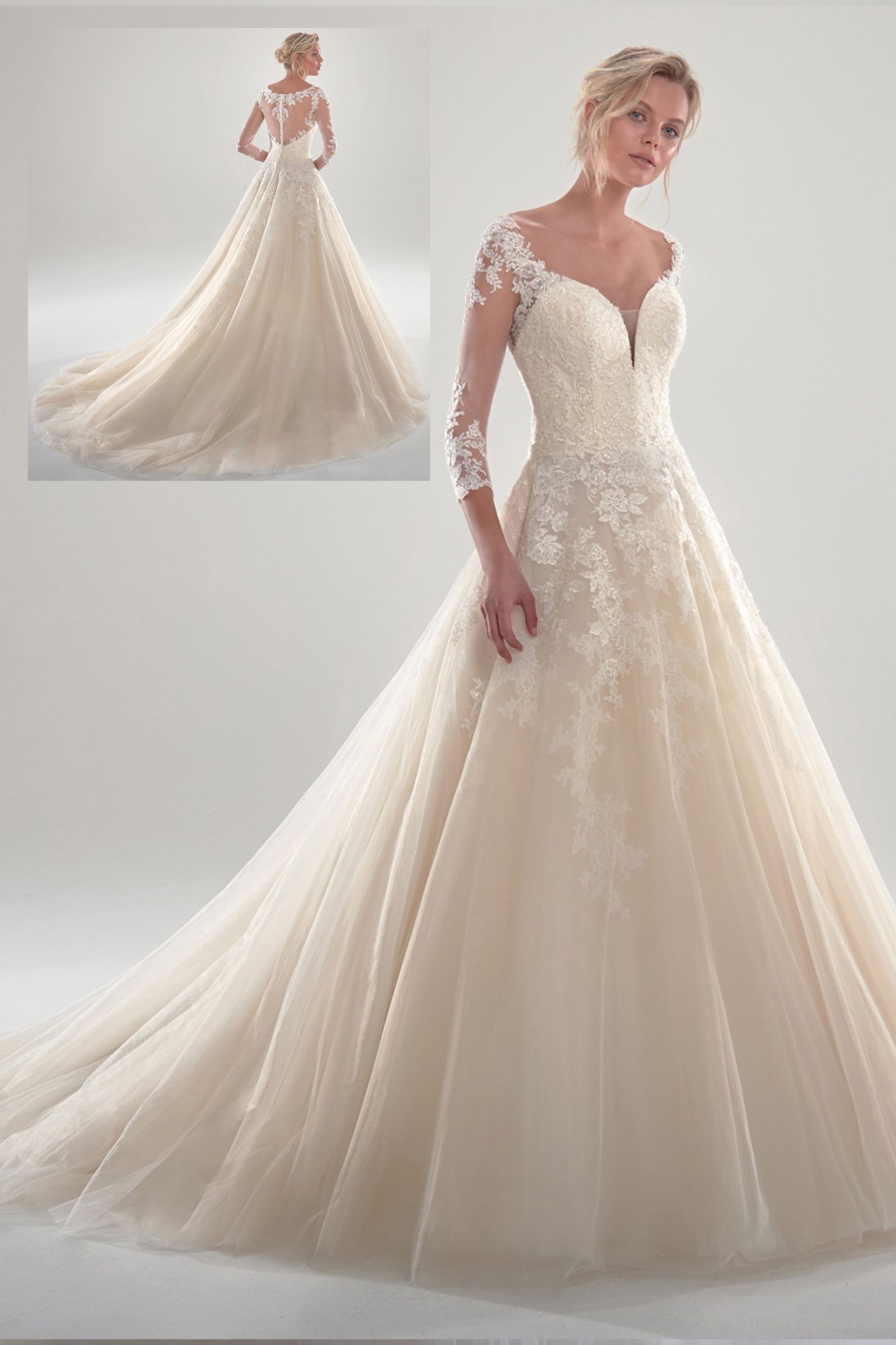 Una donna indossa un abito da sposa con maniche lunghe e strascico.