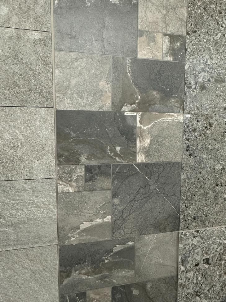 A Close Up of a Tile Floor With a Marble Border — Traditional Tiles & Flooring in Palm Cove, QLD