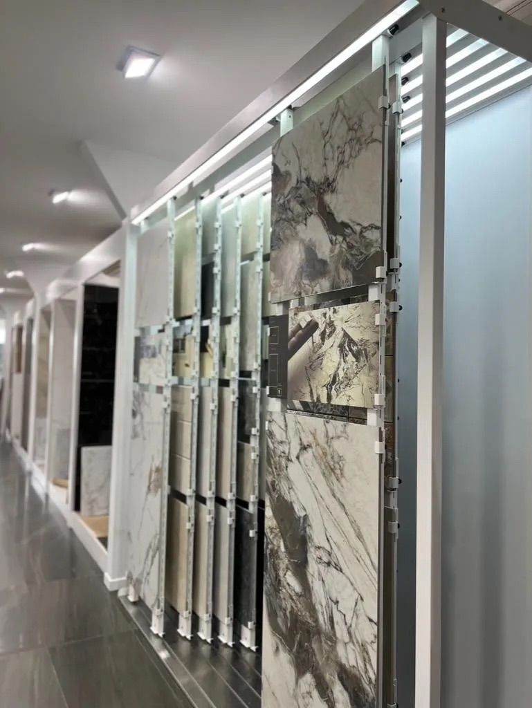 A Row of Tiles Hanging on a Wall in a Store — Traditional Tiles & Flooring In Woree, QLD