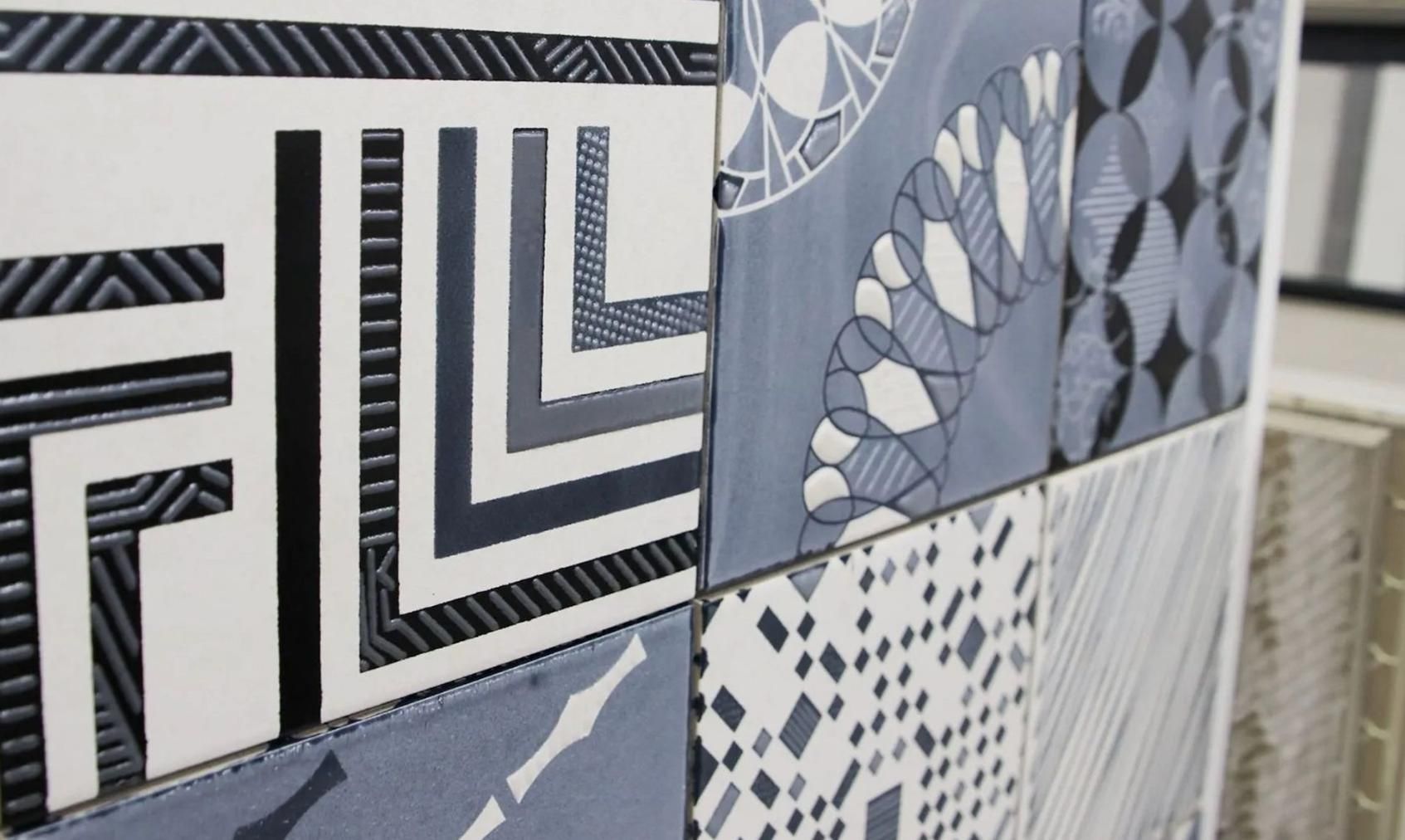 A Close Up of a Tile With a Geometric Pattern on It — Traditional Tiles & Flooring in Redlynch, QLD