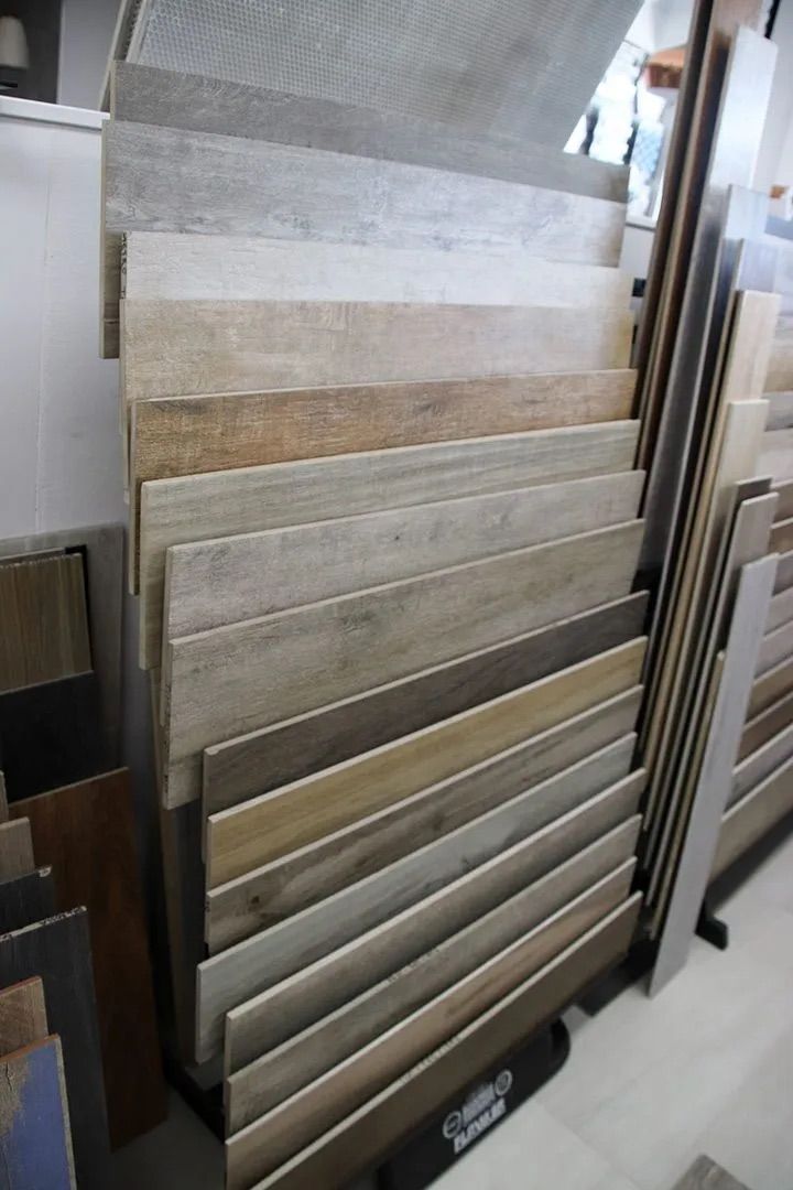 A Display of Different Types of Wood in a Store — Traditional Tiles & Flooring In Woree, QLD