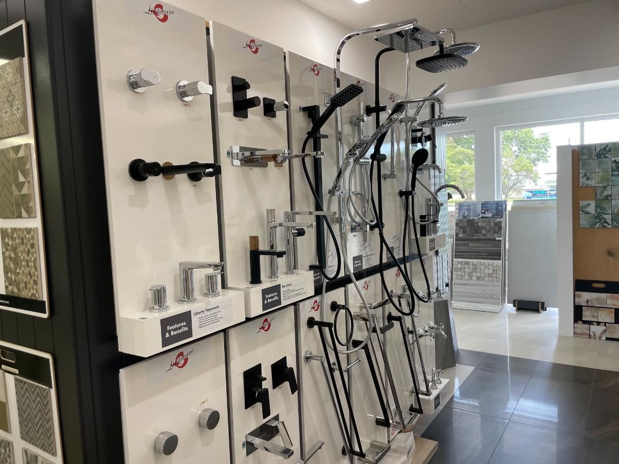 There Are Many Different Types of Shower Heads on Display in This Store — Traditional Tiles & Flooring in Gordonvale, QLD
