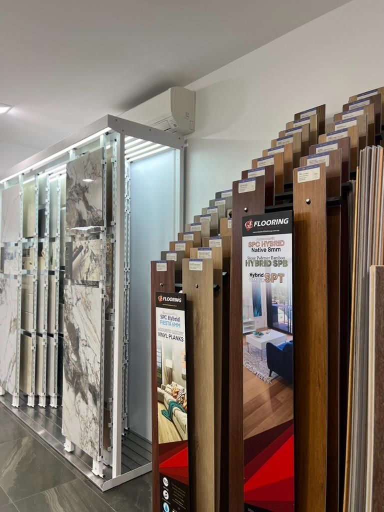 A Showroom Filled With Lots of Different Types of Flooring — Traditional Tiles & Flooring In Woree, QLD