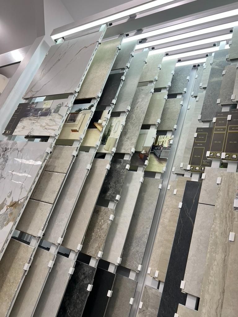 A Variety of Tiles Are Displayed on Shelves in a Store — Traditional Tiles & Flooring In Woree, QLD