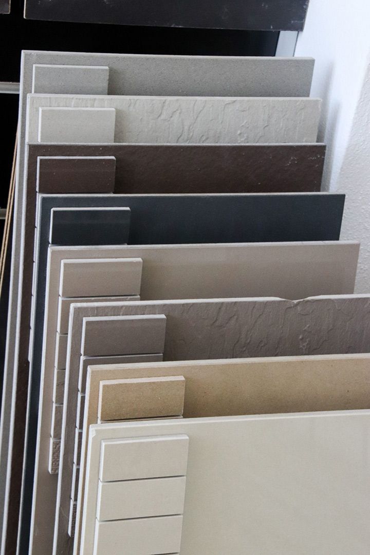 A Bunch of Tiles Are Stacked on Top of Each Other — Traditional Tiles & Flooring In Woree, QLD