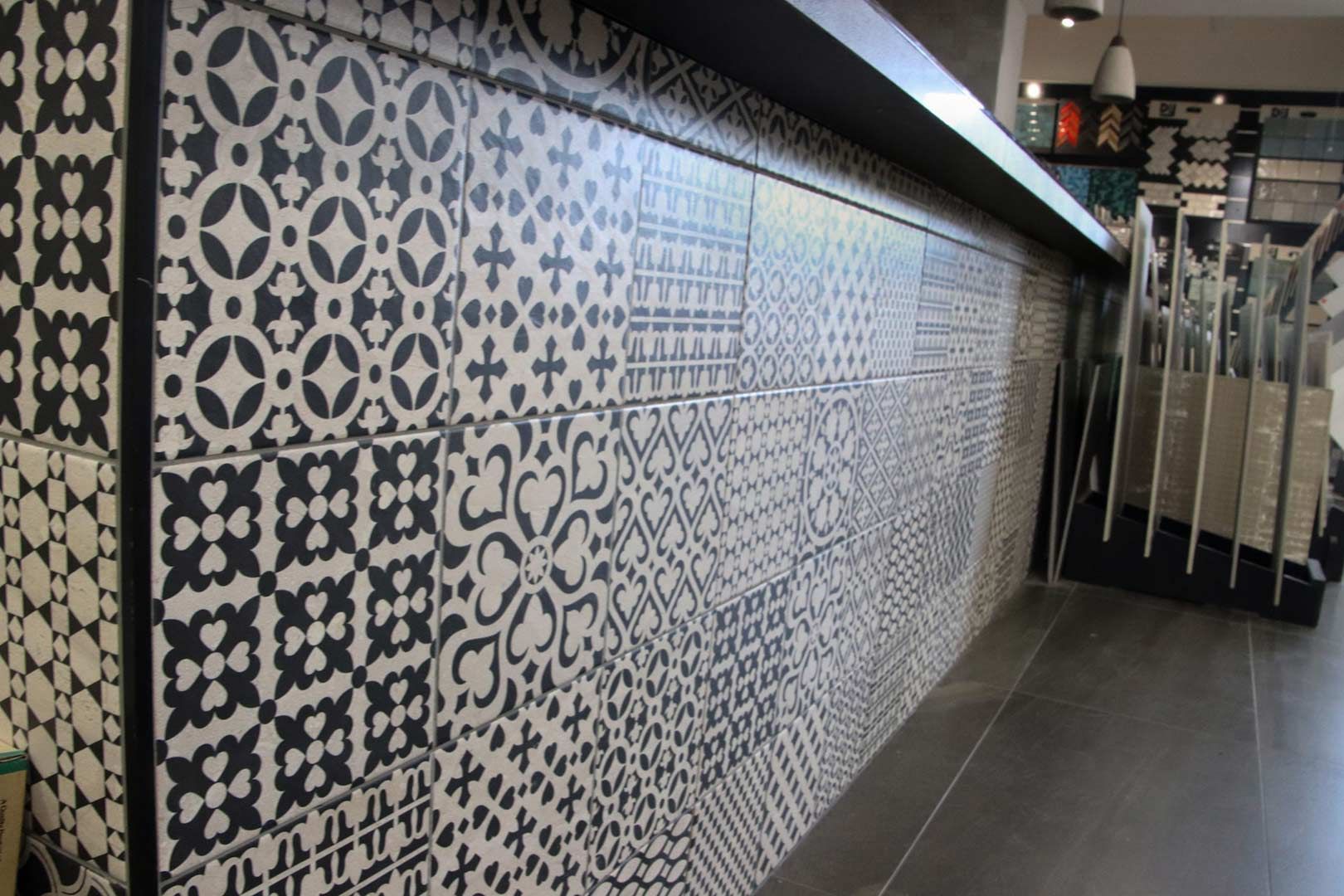 A Black and White Tile Wall with A Geometric Pattern — Traditional Tiles & Flooring In Woree, QLD