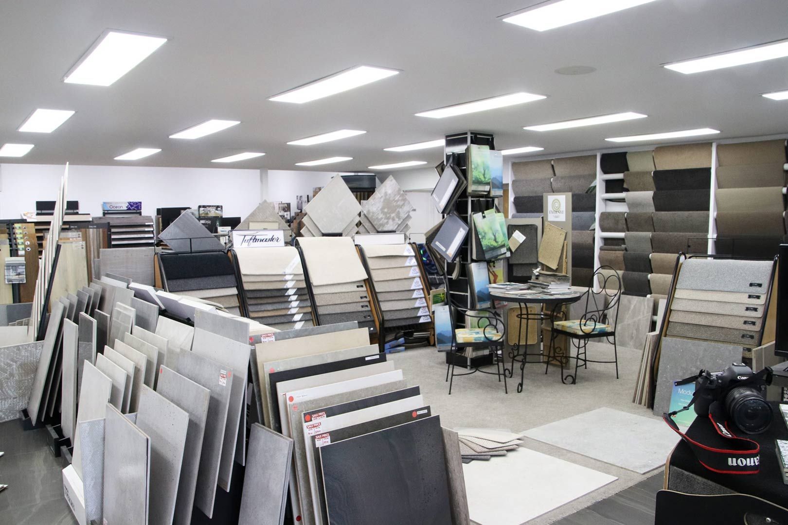 A Large Room Filled with Lots of Tiles and Furniture — Traditional Tiles & Flooring In Woree, QLD