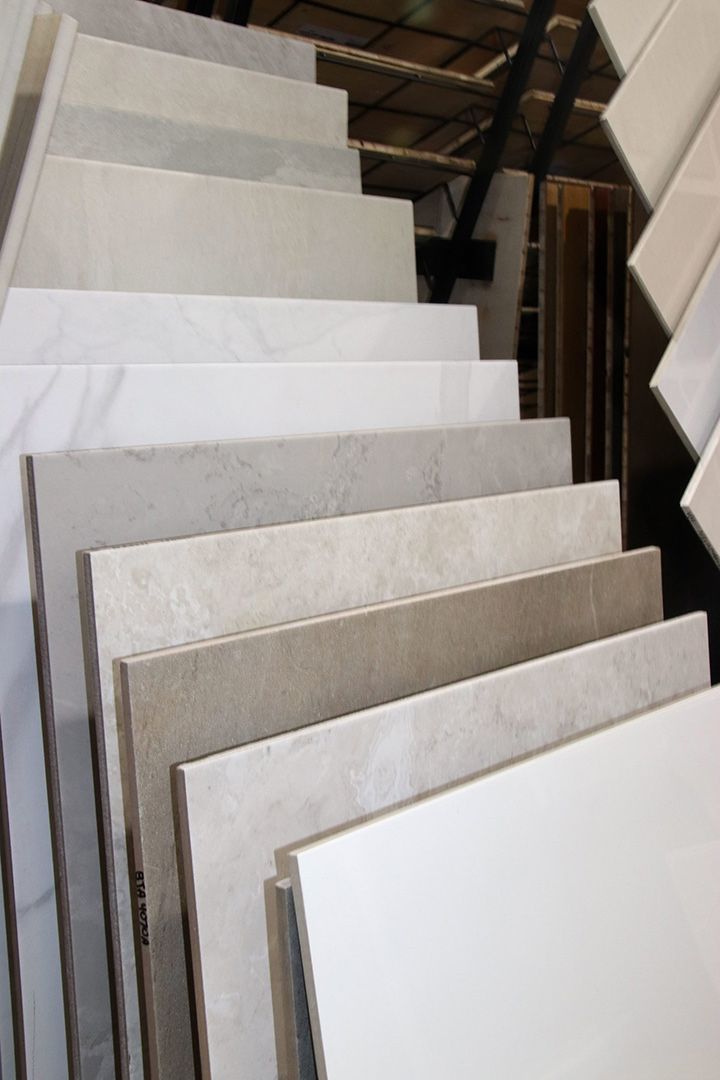 A Bunch of Tiles Are Stacked on Top of Each Other — Traditional Tiles & Flooring in Gordonvale, QLD