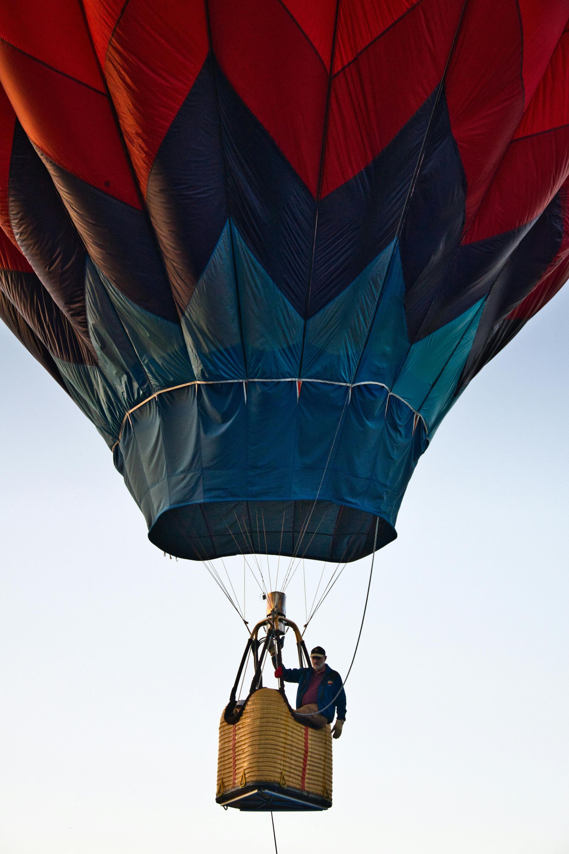 A hot air balloon with a basket attached to it