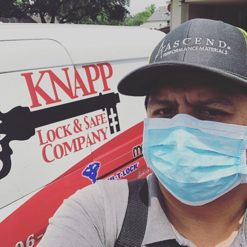 Knapp lock and Safe: Professional locksmith proudly posing in front of their work van, ready to provide exceptional locksmith services.