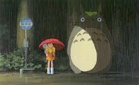 Girl with red umbrella standing beside Totoro at a rainy bus stop.