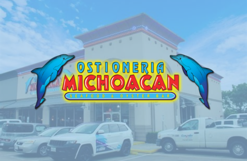 A picture of a michoacan store with cars parked in front of it
