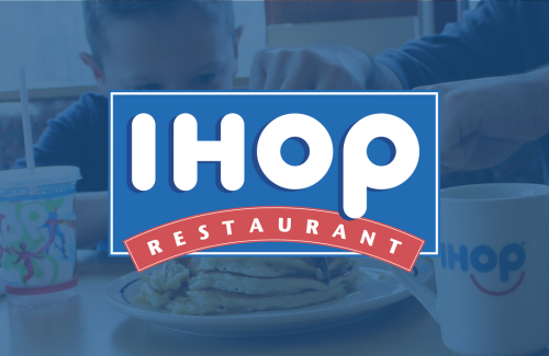 A man is eating pancakes at an ihop restaurant