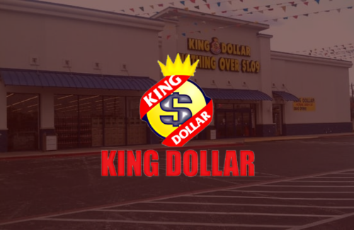 A picture of a king dollar store in a parking lot