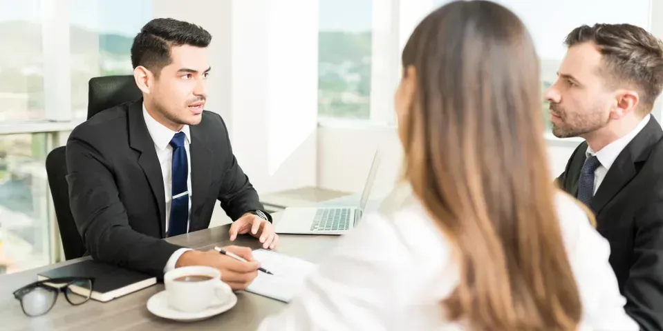 Young couple consulting an attorney