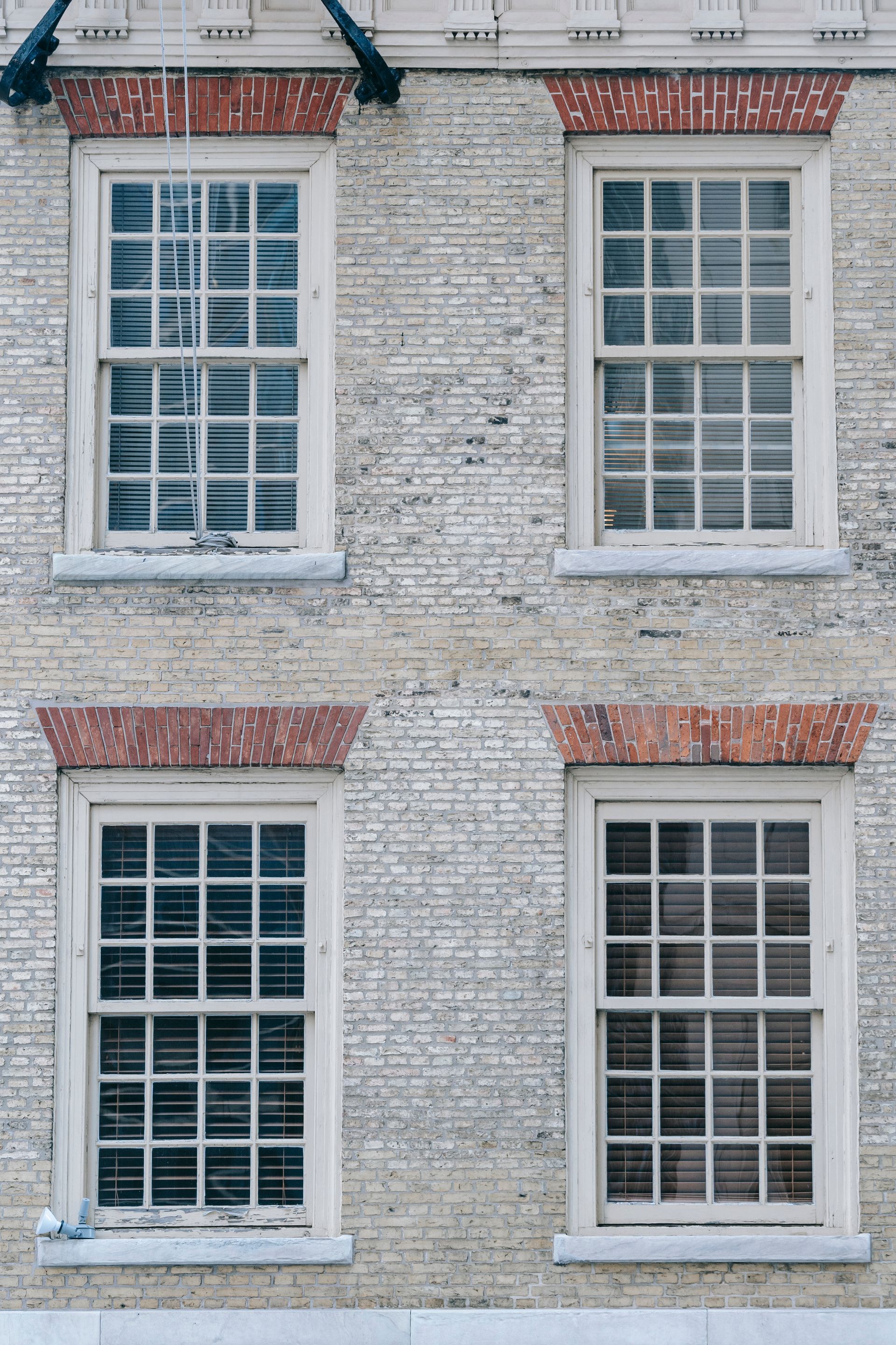 A picture of the outside of a brick building. 