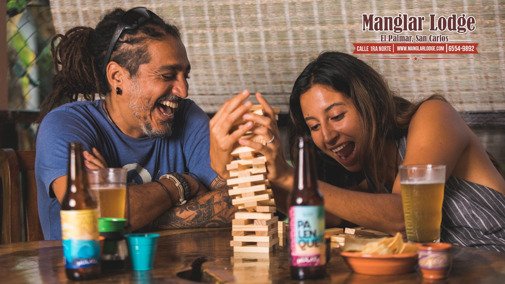 Guests enjoying food and games at Manglar Lodge restaurant in El Palmar Panama