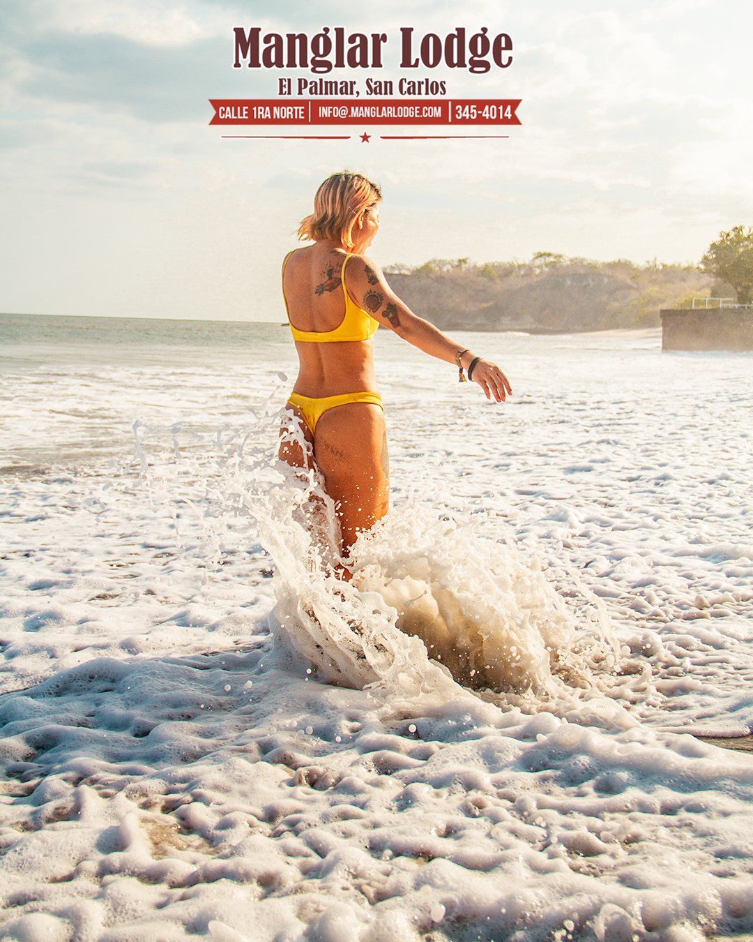 Guest enjoying a walk on El Palmar Beach near Manglar Lodge in Panama