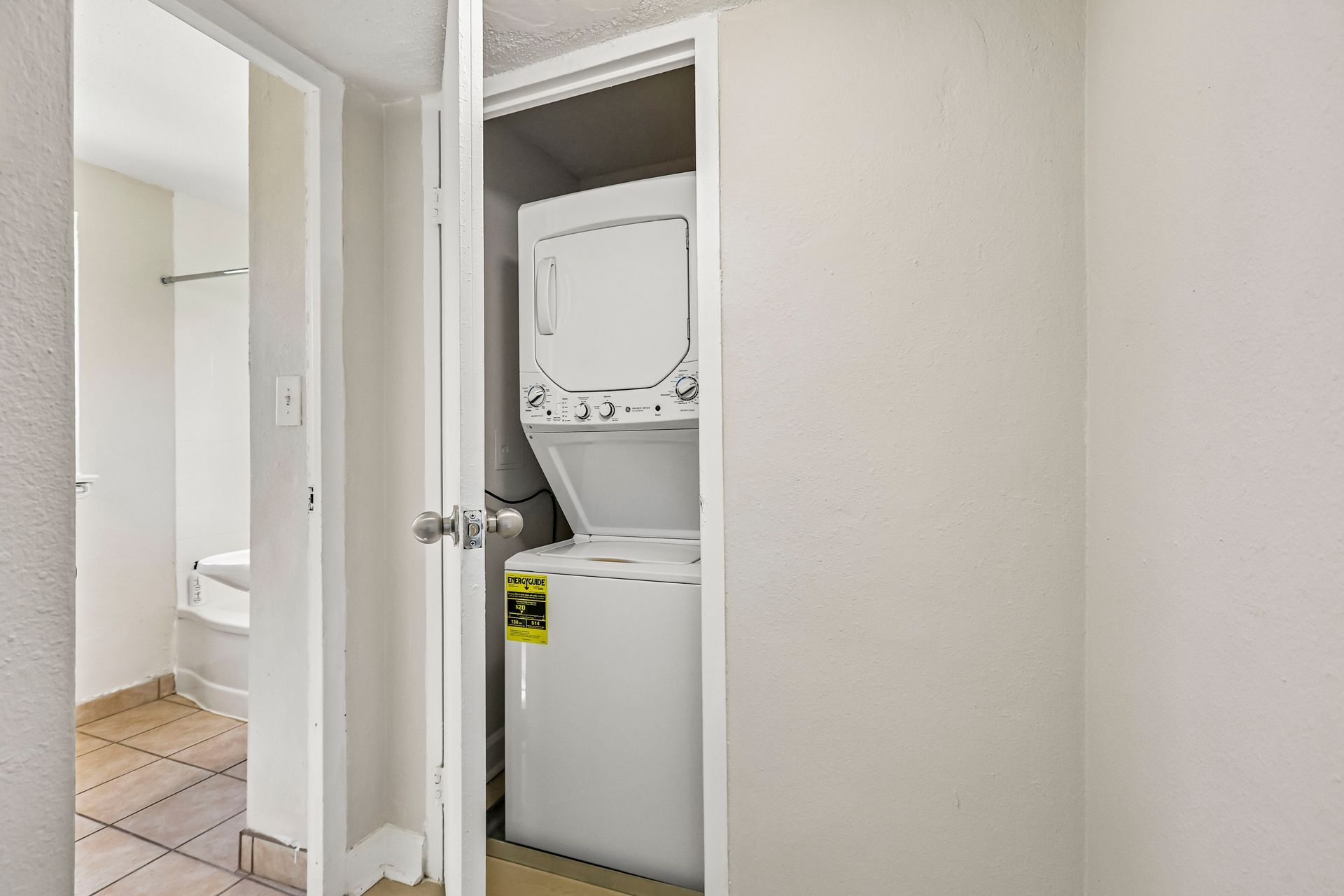  washer and dryer in an apartment laundry closet at Brickline Apartments