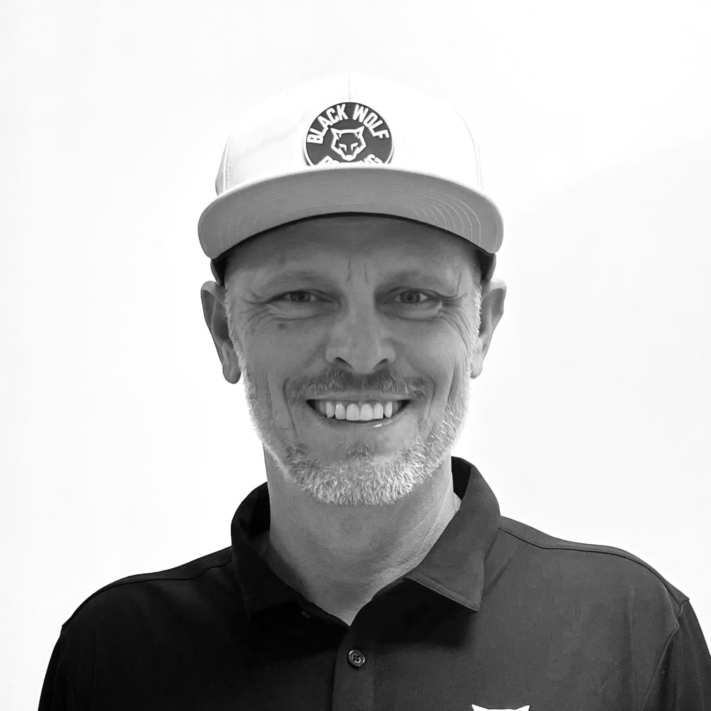 Man wearing a baseball cap with 