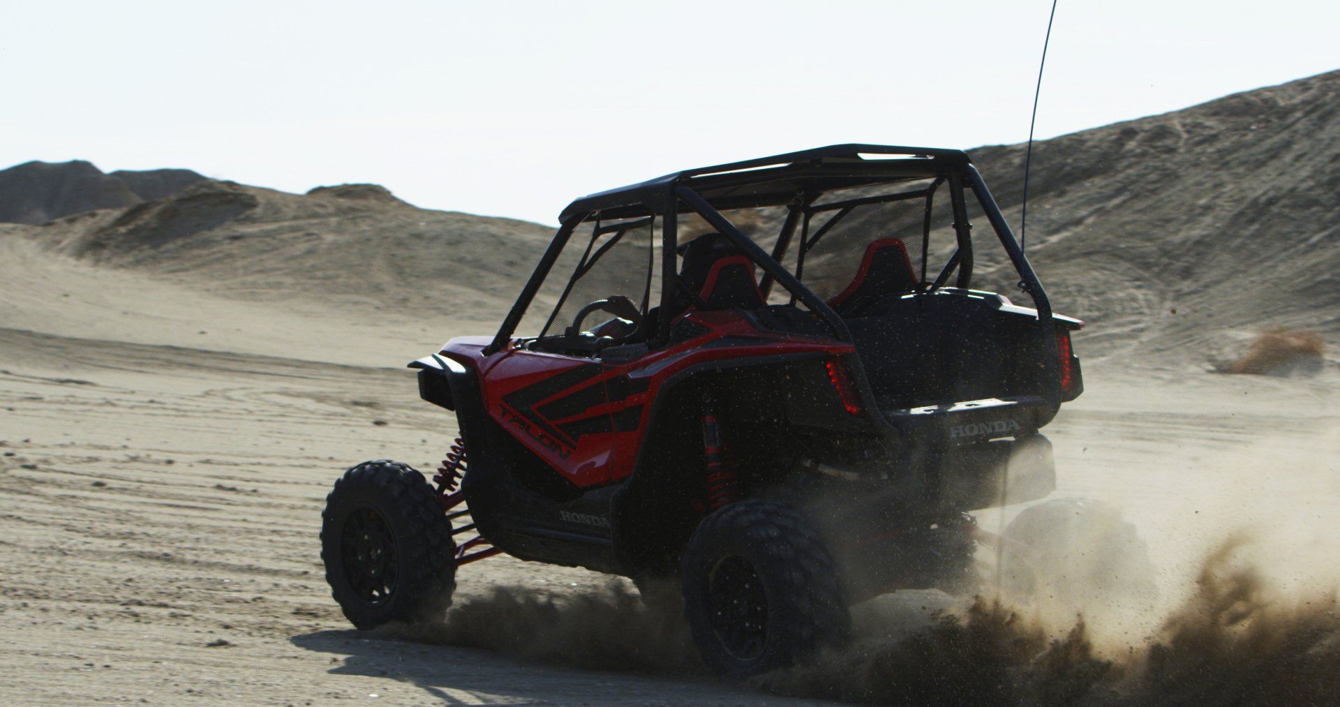 red UTV riding through borrego springs