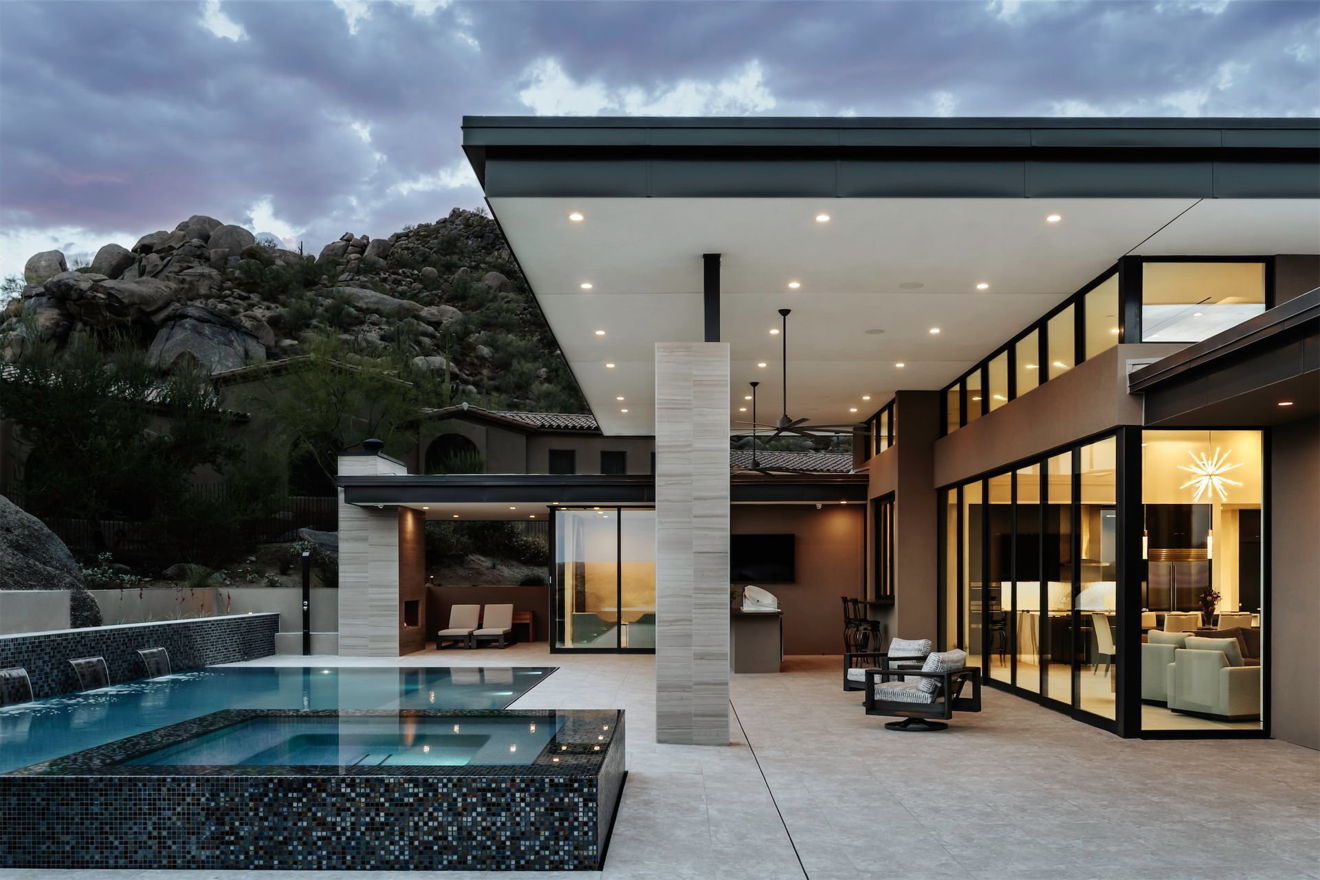 A large house with a swimming pool in the backyard