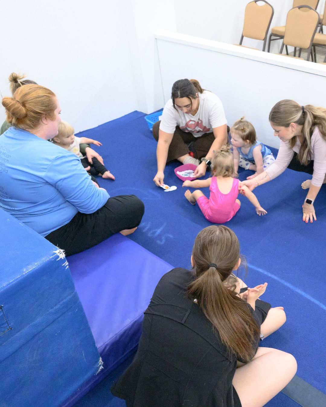 Parents and toddlers in a Bounce & Bond class