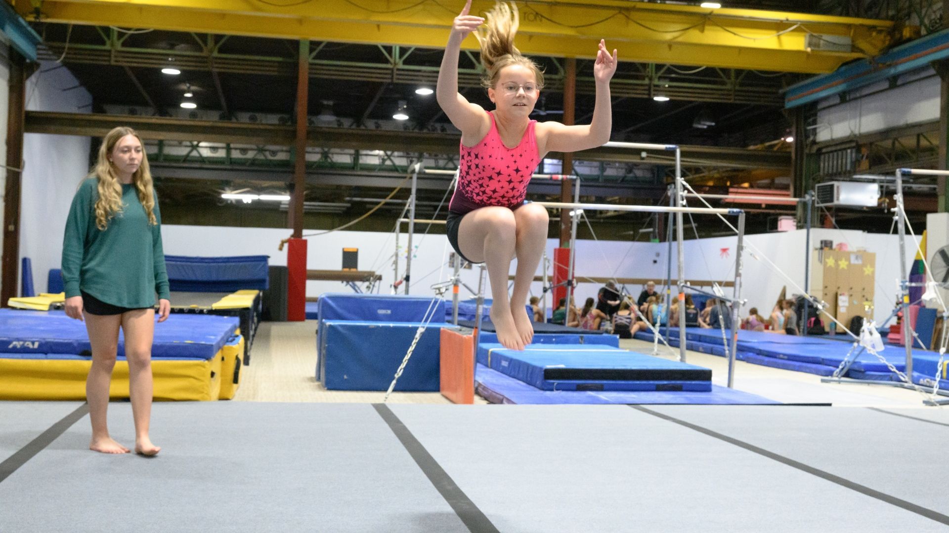 Gymnast jumping on the trampoline during open gym
