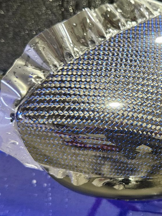 Car side mirror with protective film applied.