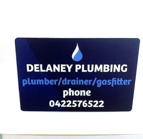 A Gas Water system Installed outside a house fixed to the wall  — Delaney Plumbing Services In Taree, NSW