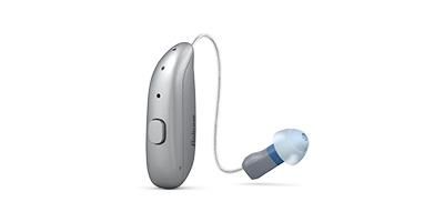 A close up of a hearing aid on a white background.