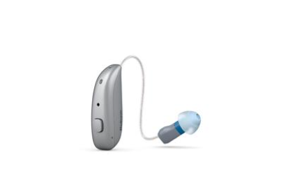 A close up of a hearing aid on a white background.