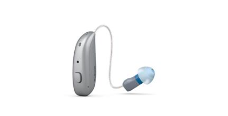 A close up of a hearing aid on a white background.