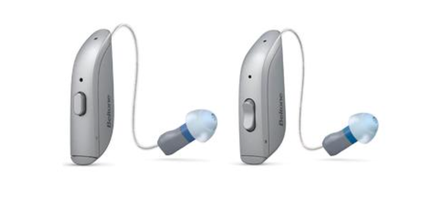 A pair of hearing aids on a white background