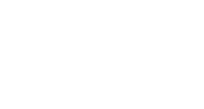A view of a blue sky with fluffy white clouds, with the sun shining brightly through them.