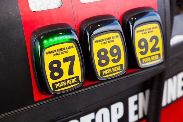 Three gas pumps with the number 87 89 and 92 on them | Autotrends