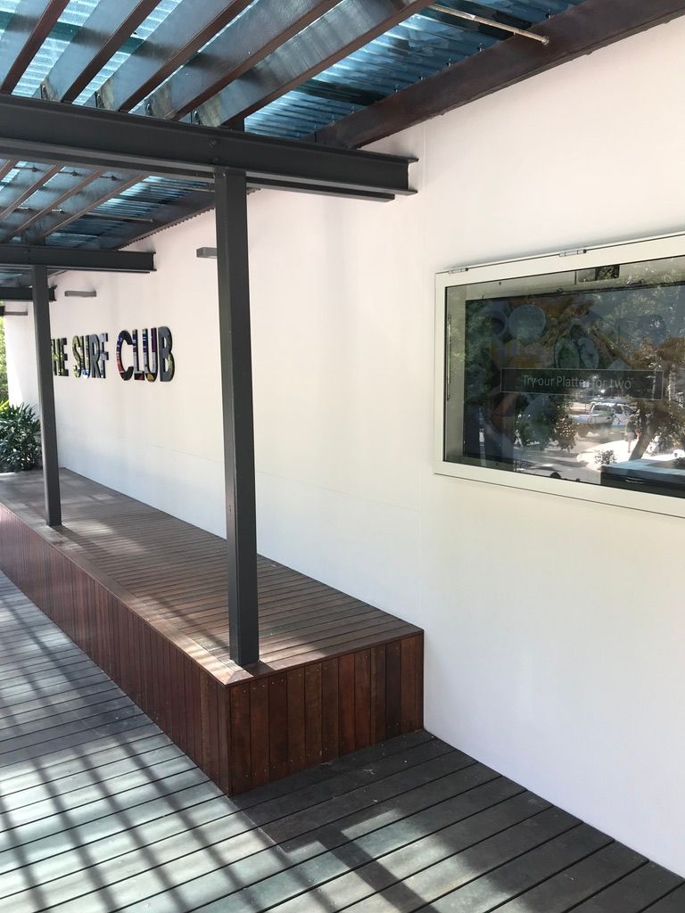 A White Wall With the Word Club Written on It — Dezigner Finishes Professional Painting & Decorating in Sunshine Coast, QLD